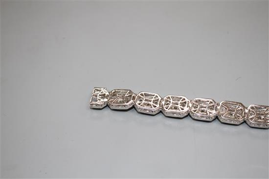 A modern 14k white metal and diamond encrusted octagonal link bracelet, 18.3cm, gross weight, 35.8 grams.